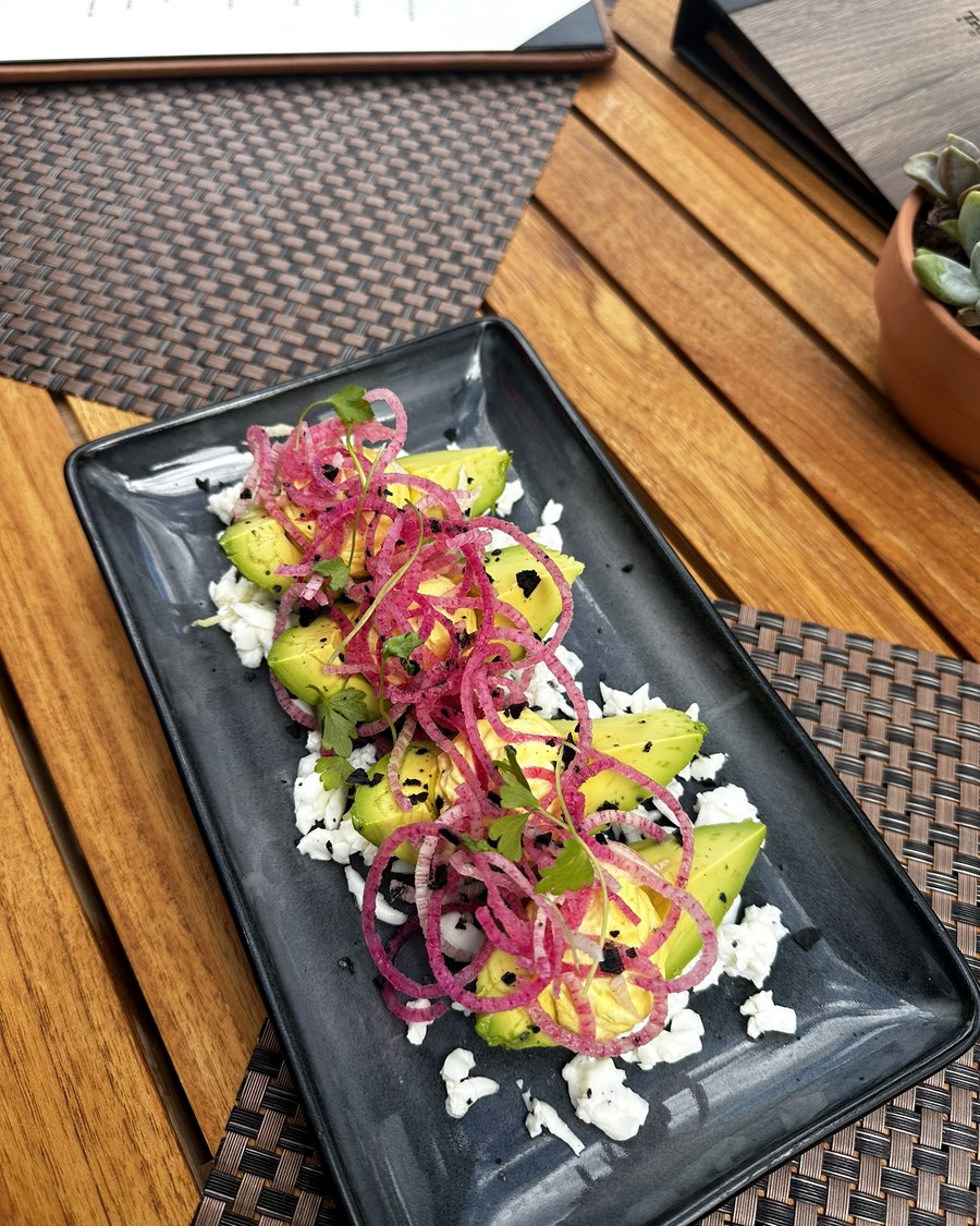Colorful plated salad with garnish